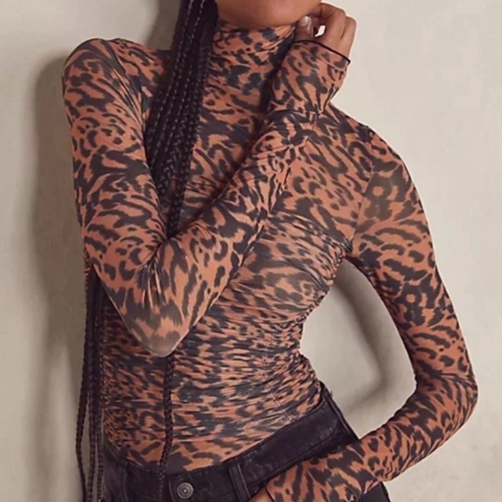 NWOT FREE PEOPLE Sz L UNDER IT ALL PRINTED MESH BODYSUIT ANIMAL LEOPARD PRINT